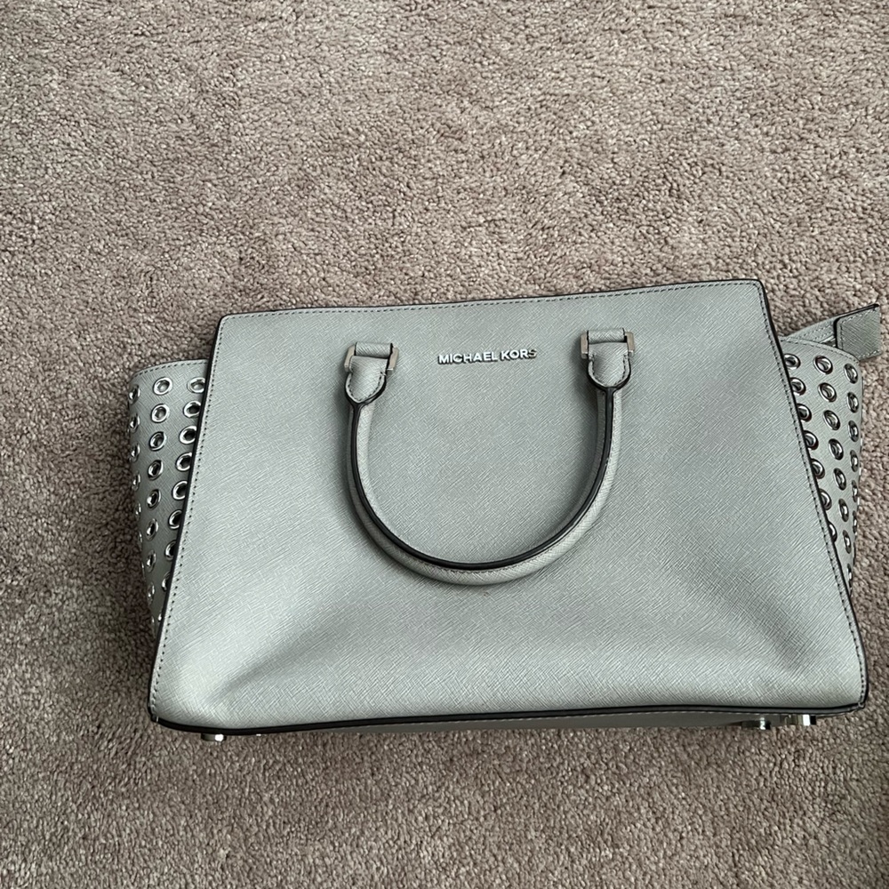 Gently used grey leather Michael Kors tote with metallic embellishments